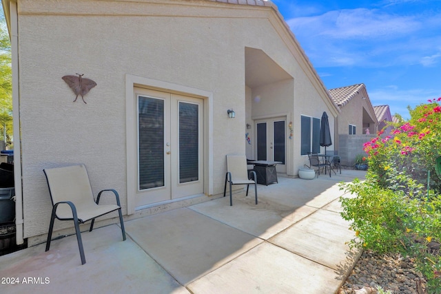 exterior space with a patio area and french doors