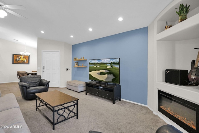 living room with carpet, ceiling fan, and vaulted ceiling