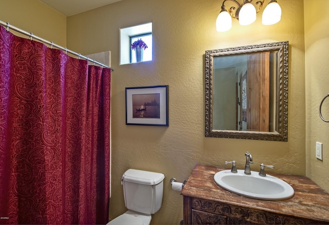 bathroom with toilet and sink