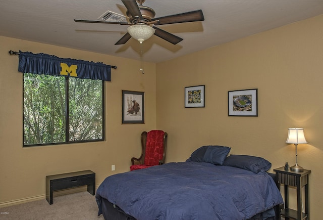 carpeted bedroom with ceiling fan