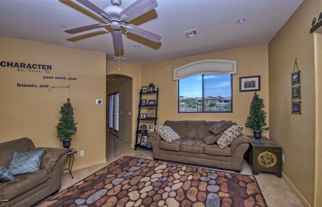 living room with ceiling fan