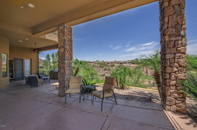 view of patio / terrace featuring ceiling fan and a grill