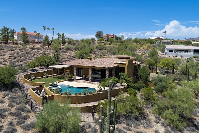 view of pool featuring a patio area