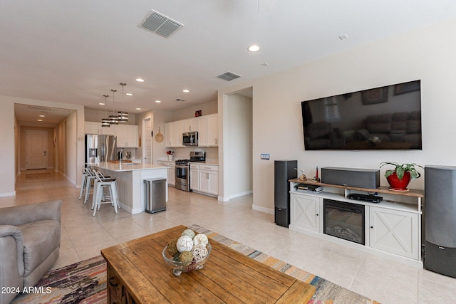 tiled living room with sink