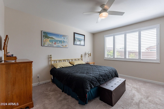 bedroom with ceiling fan and carpet