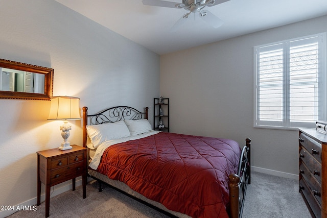 bedroom featuring ceiling fan and carpet floors