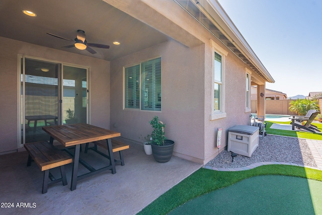 view of patio with ceiling fan