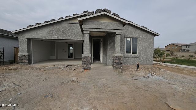 view of front of home with a patio