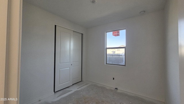 unfurnished bedroom featuring a closet