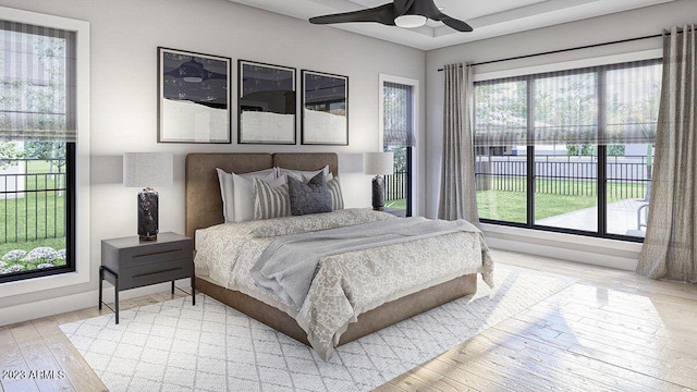 bedroom featuring light hardwood / wood-style flooring and ceiling fan