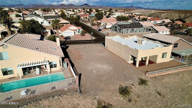 drone / aerial view featuring a mountain view