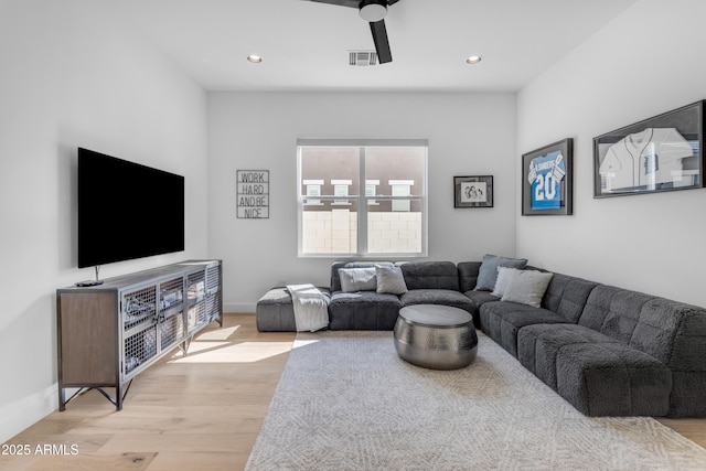 living area featuring recessed lighting, visible vents, light wood-style flooring, and ceiling fan