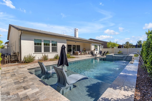 view of swimming pool featuring a patio, a fenced backyard, a pool with connected hot tub, and an outdoor hangout area