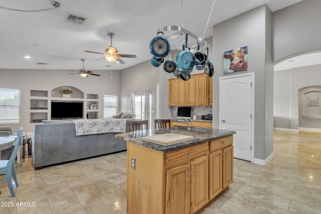 43271 W Little Dr, Maricopa, AZ 85138 - kitchen with ceiling fan, arched walkways, built in features, and plenty of natural light