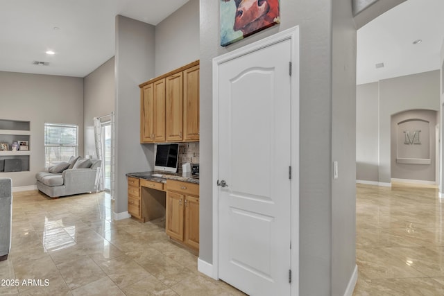 43271 W Little Dr, Maricopa, AZ 85138 - hallway featuring a high ceiling, marble finish floor, baseboards, visible vents, and recessed lighting