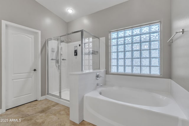 43271 W Little Dr, Maricopa, AZ 85138 - bathroom with a garden tub, a shower stall, and a healthy amount of sunlight