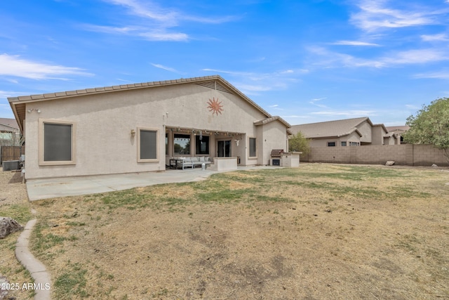 43271 W Little Dr, Maricopa, AZ 85138 - back of house with stucco siding, fence, and a patio area