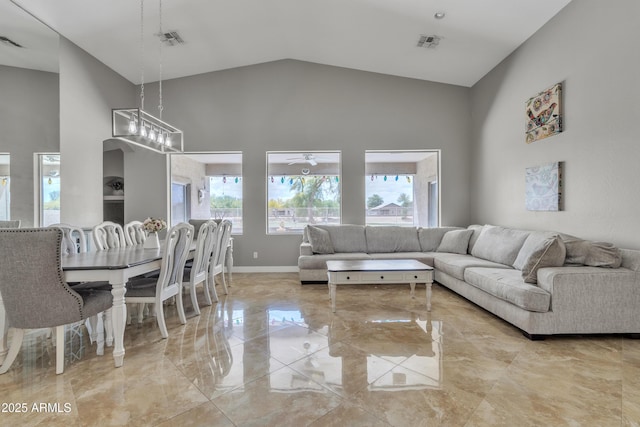 43271 W Little Dr, Maricopa, AZ 85138 - living room with high vaulted ceiling, marble finish floor, and visible vents