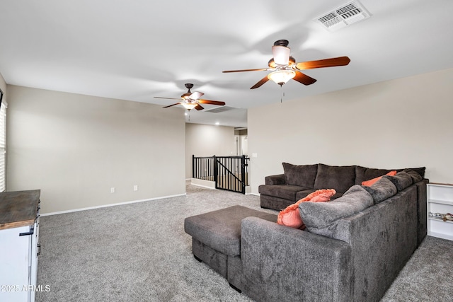 carpeted living room featuring ceiling fan