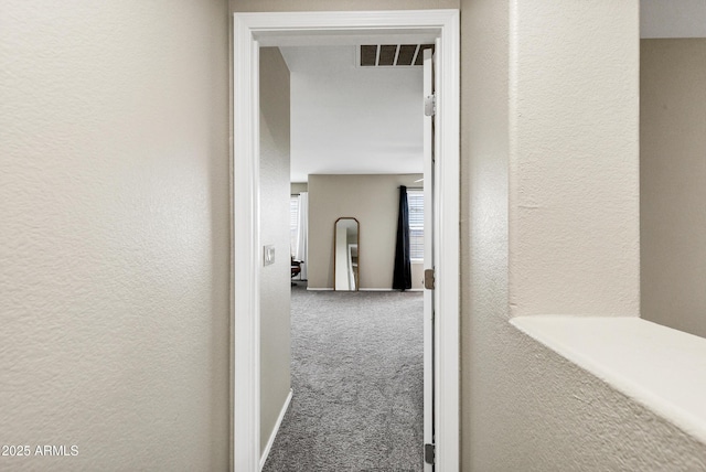 corridor featuring carpet