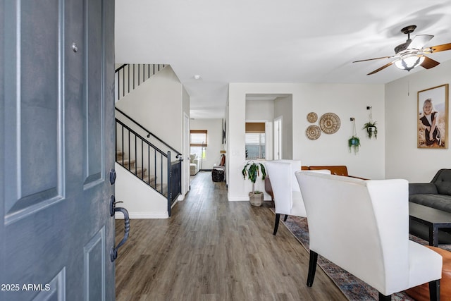 entrance foyer with wood-type flooring and ceiling fan