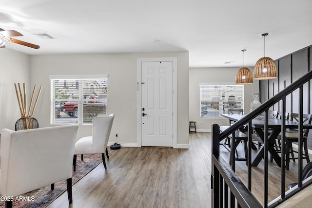 entrance foyer featuring ceiling fan and light wood-type flooring