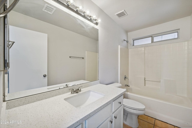 full bathroom with  shower combination, vanity, tile patterned flooring, and toilet