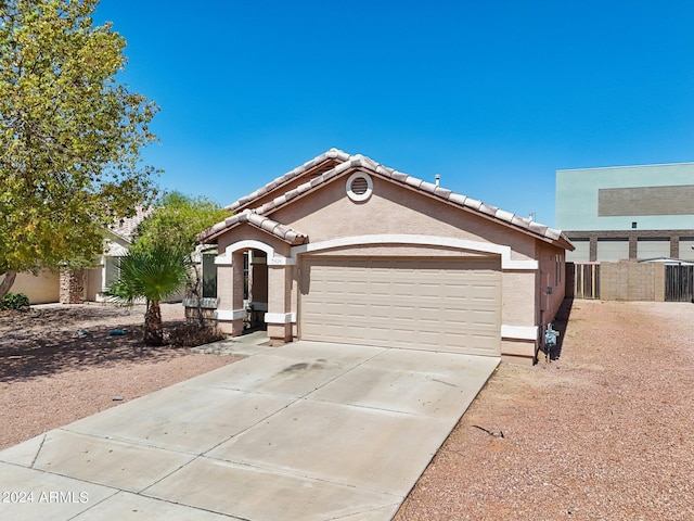 view of front of home with a garage