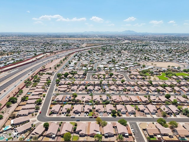 drone / aerial view featuring a mountain view