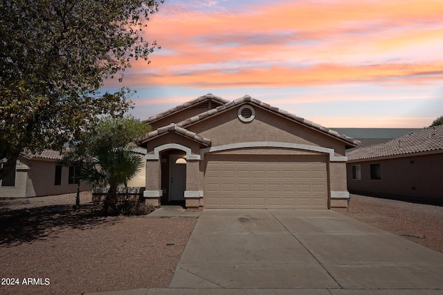 view of front of house with a garage