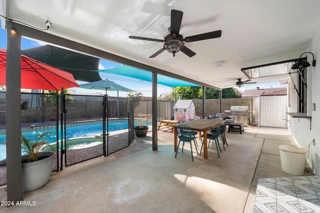 view of patio with a fenced in pool