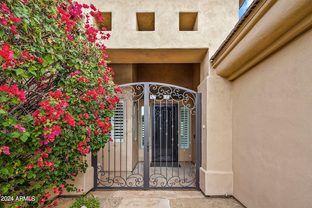 entrance to property featuring a gate