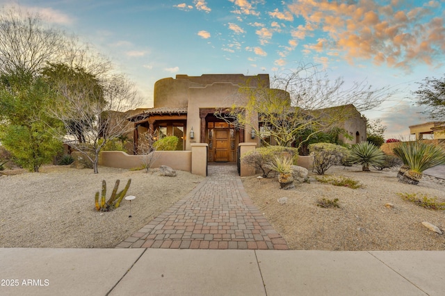 view of pueblo-style home