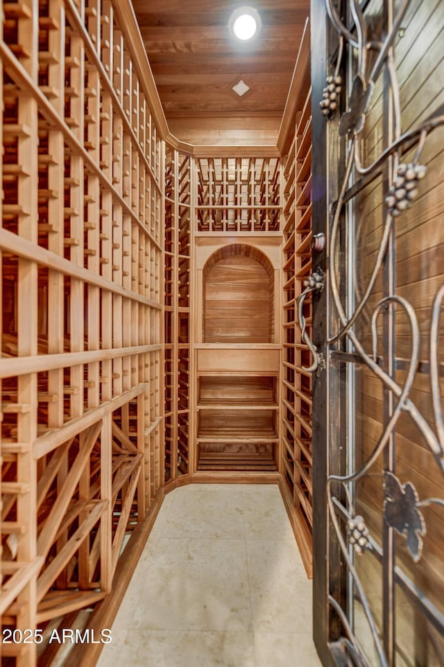 wine room featuring wooden ceiling