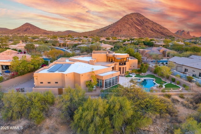 aerial view at dusk with a mountain view