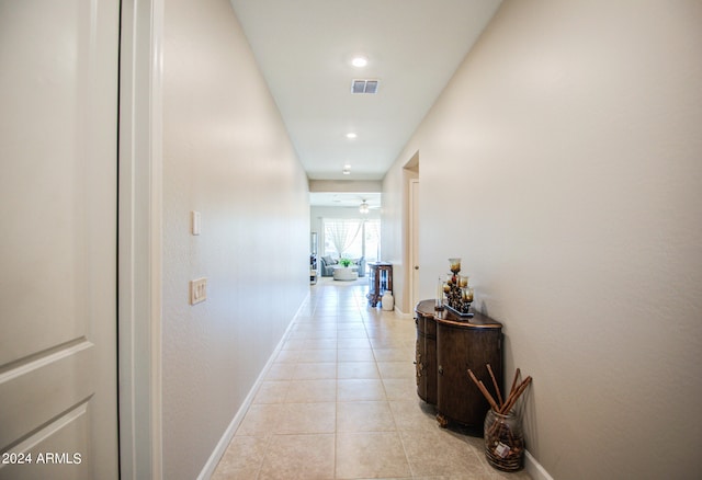 hall with light tile patterned flooring