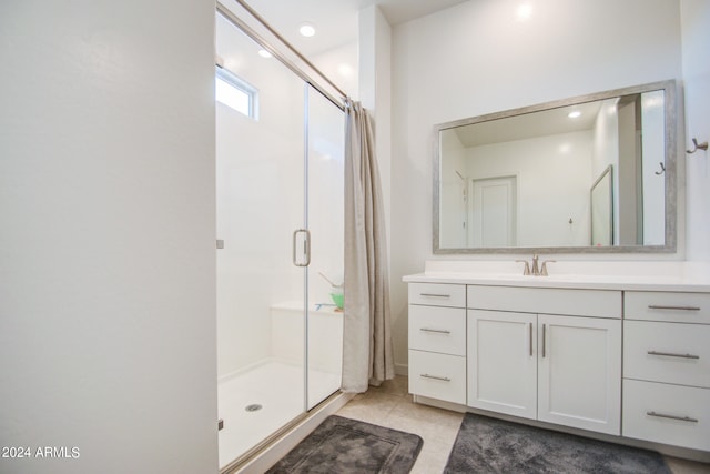 bathroom featuring vanity and walk in shower