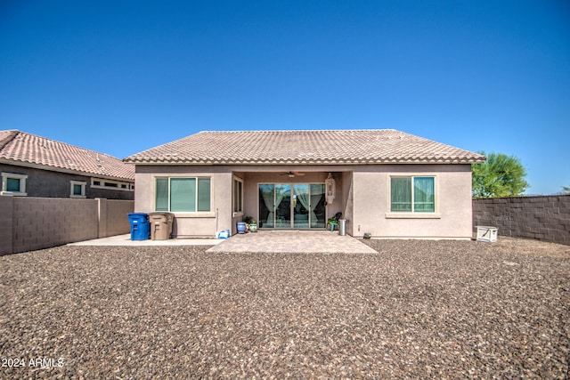 rear view of property with a patio area