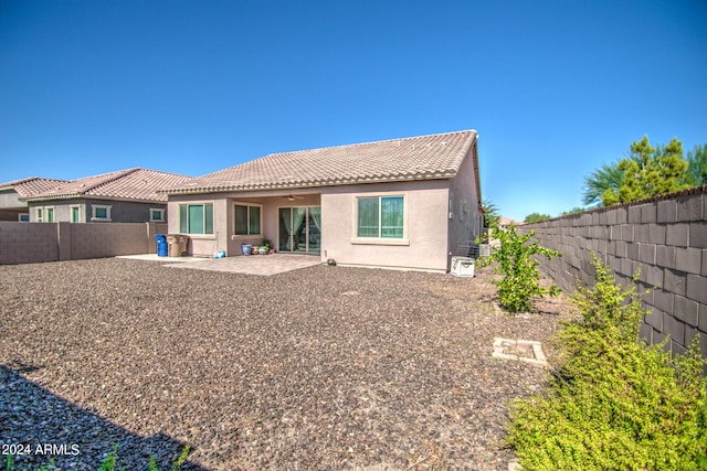 back of house featuring a patio area