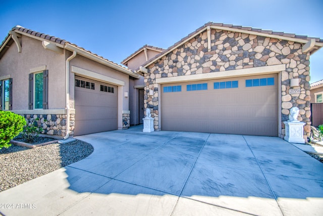 view of front of home with a garage