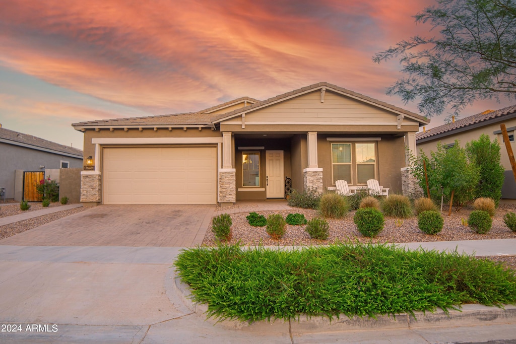 view of front of property with a garage