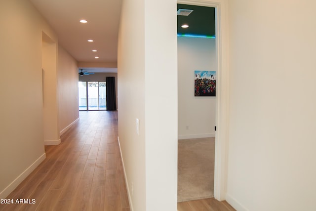 hall featuring light hardwood / wood-style flooring