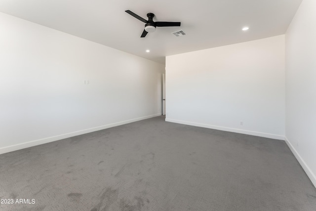 unfurnished room featuring visible vents, recessed lighting, ceiling fan, and dark carpet
