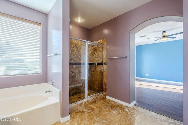 bathroom with plus walk in shower and ceiling fan