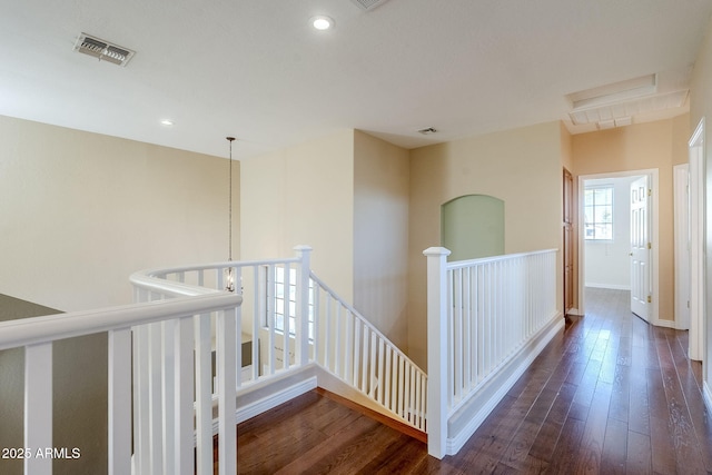 corridor featuring dark hardwood / wood-style flooring