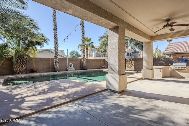 view of swimming pool with ceiling fan, a patio area, area for grilling, and a grill