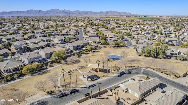 birds eye view of property with a mountain view