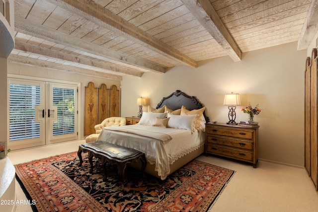 bedroom with wood ceiling, beam ceiling, and french doors