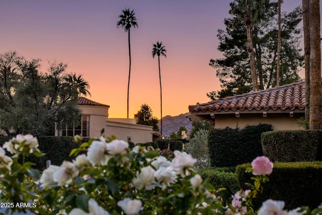 view of property exterior at dusk