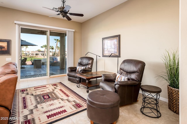 sitting room with light tile patterned flooring and ceiling fan